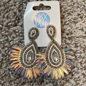 White statement earrings